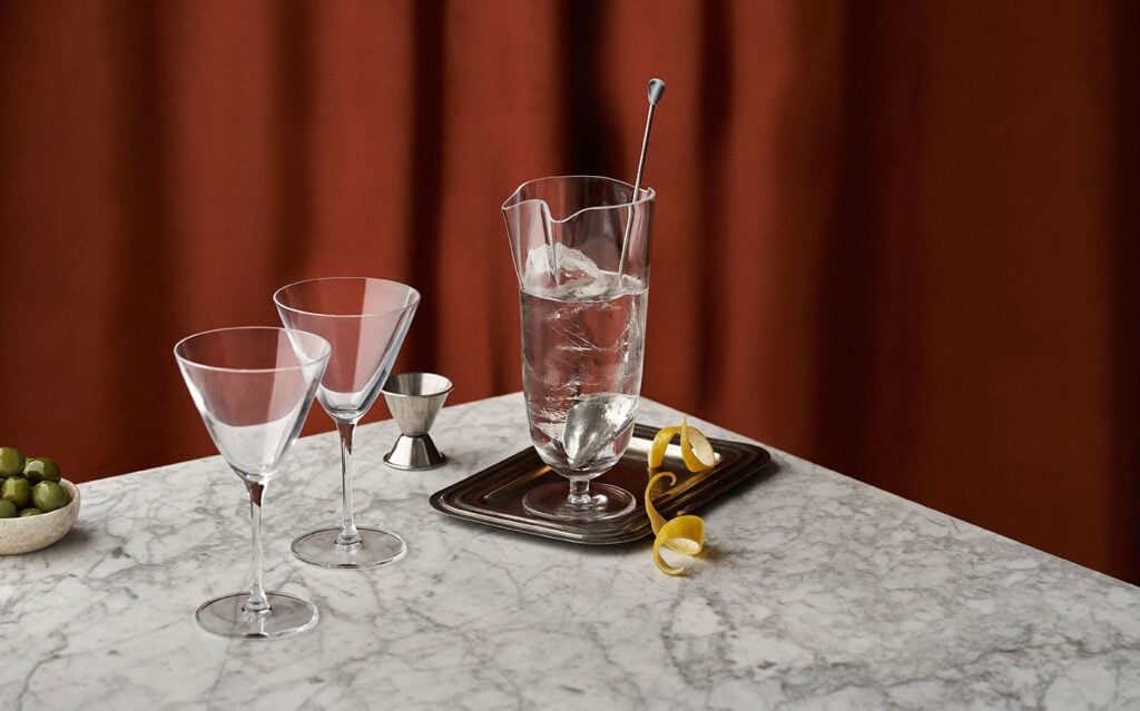 A Martini cocktail with a choice of garnishes