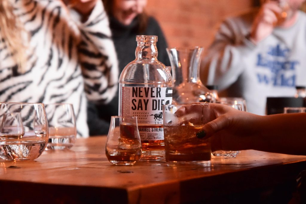 Never Say Die bourbon and glass