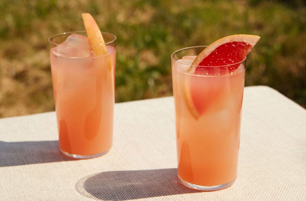 Two glasses of a non-alc Paloma cocktail made with Botivo