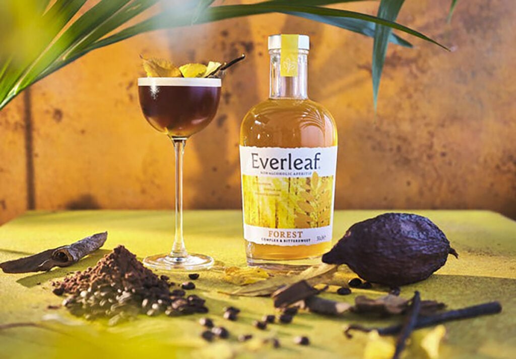 A Forest Non-Alcoholic Espresso Martini alongised a bottle of Everleaf Forest.