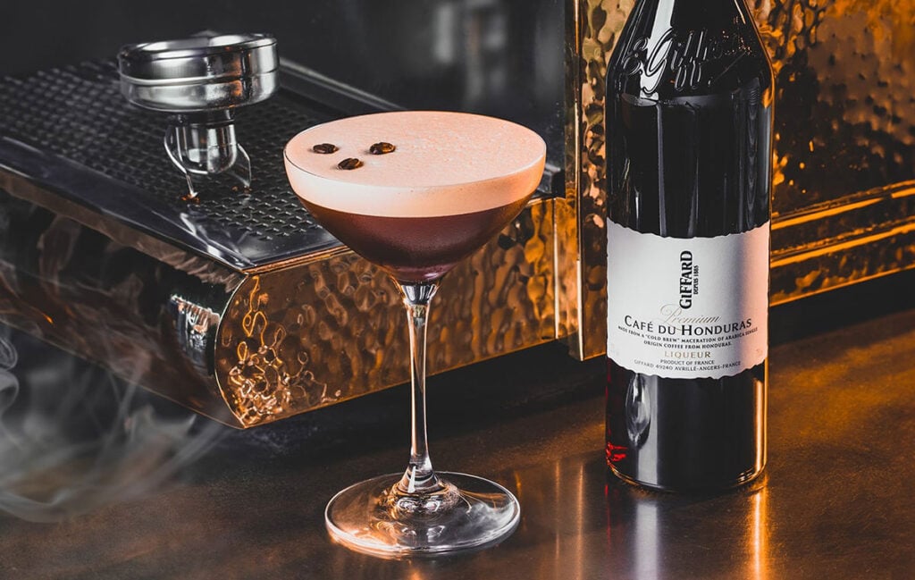 An Espresso Martini and bottle of Giffard Café du Honduras