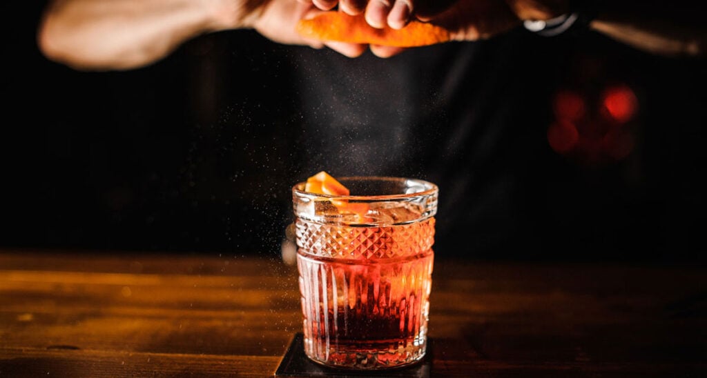 A bartender shows How to make an Old Fashioned