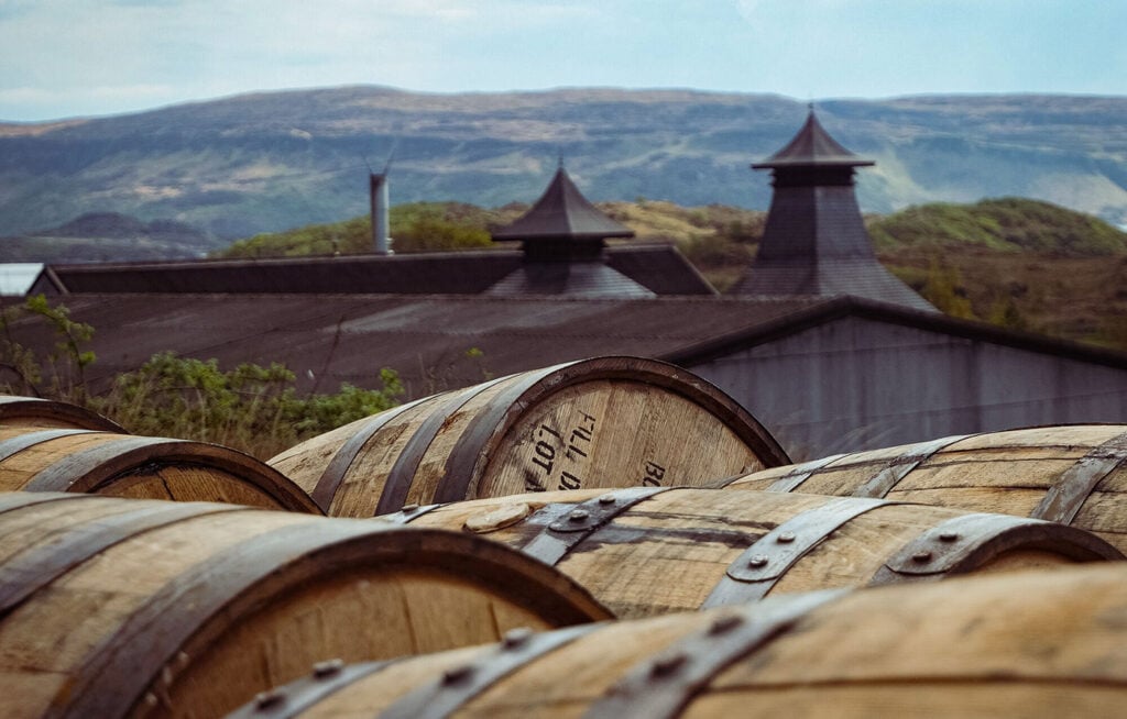 Casks of Scotch whisky in the Highlands