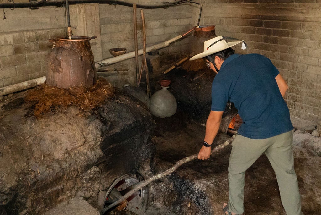 Traditional mezcal is made on stills like these