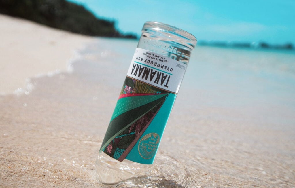Takamaka Overproof Rum on a beach in the Seychelles
