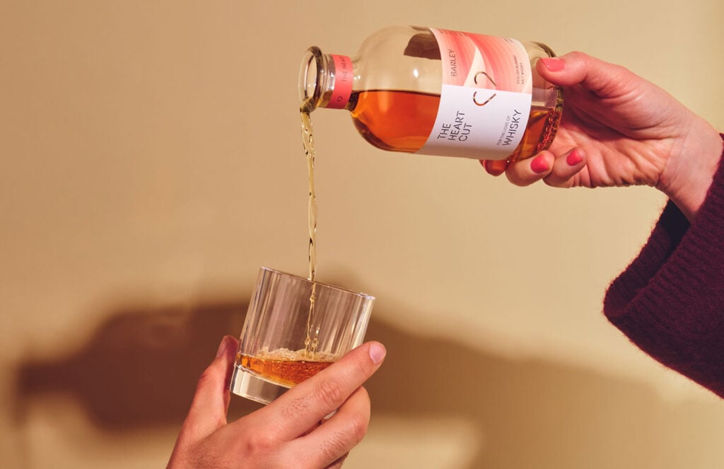 The Heart Cut x Barley whisky poured into a rocks glass
