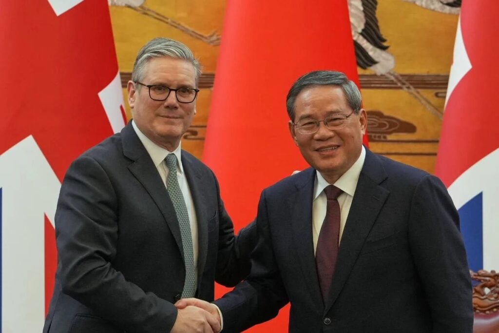 Prime Minister Keir Starmer (left) and Chinese premier Li Qian shake hands at the Great Hall of the People in Beijing (Image: PA) following the Scotch Whisky Tariff Cut in China