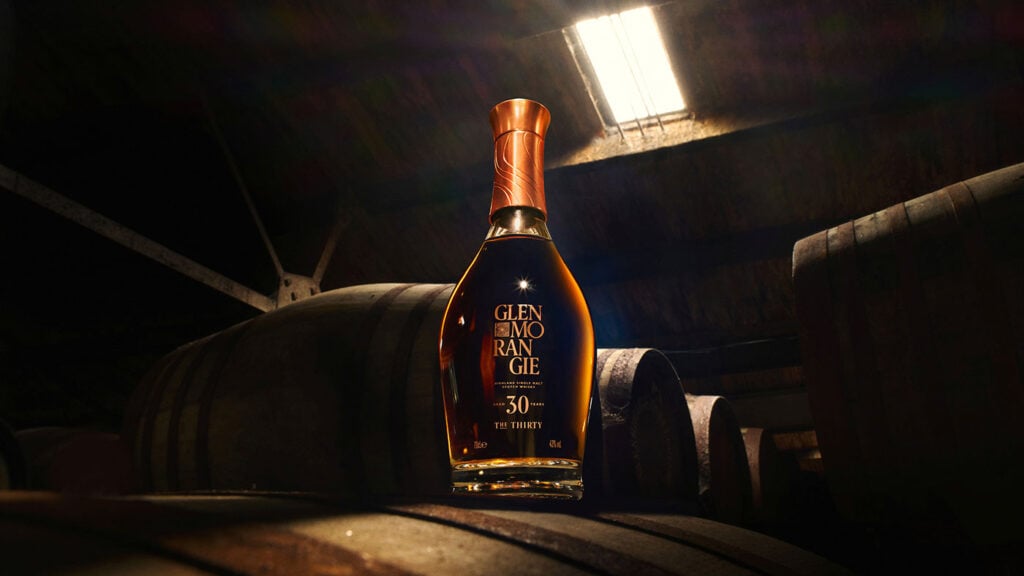 A bottle of Glenmorangie The Thirty in a warehouse