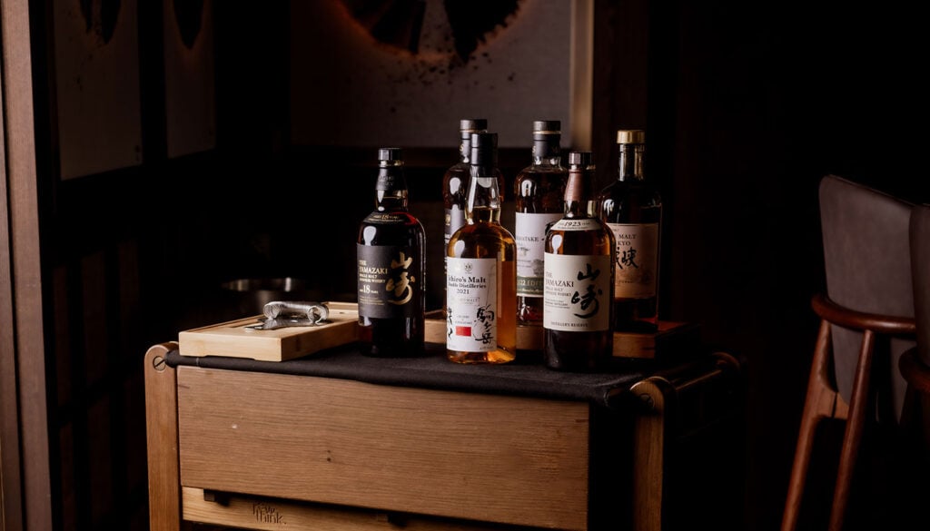 A cart full of Japanese whisky at Luna Omakase Restaurant for International Whisky Day
