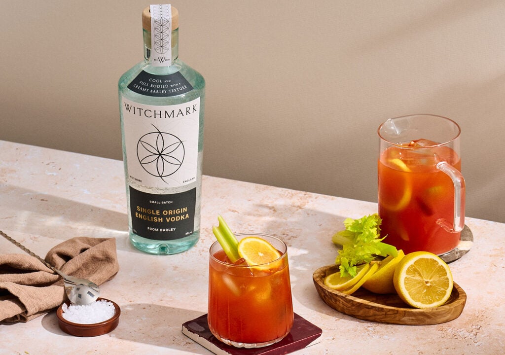 A bottle of Witchmark Single Origin English Vodka and a Bloody Mary