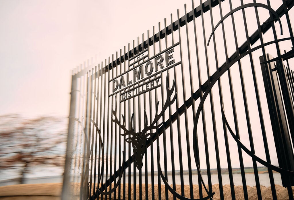 The Dalmore Distillery gates on a sunny day