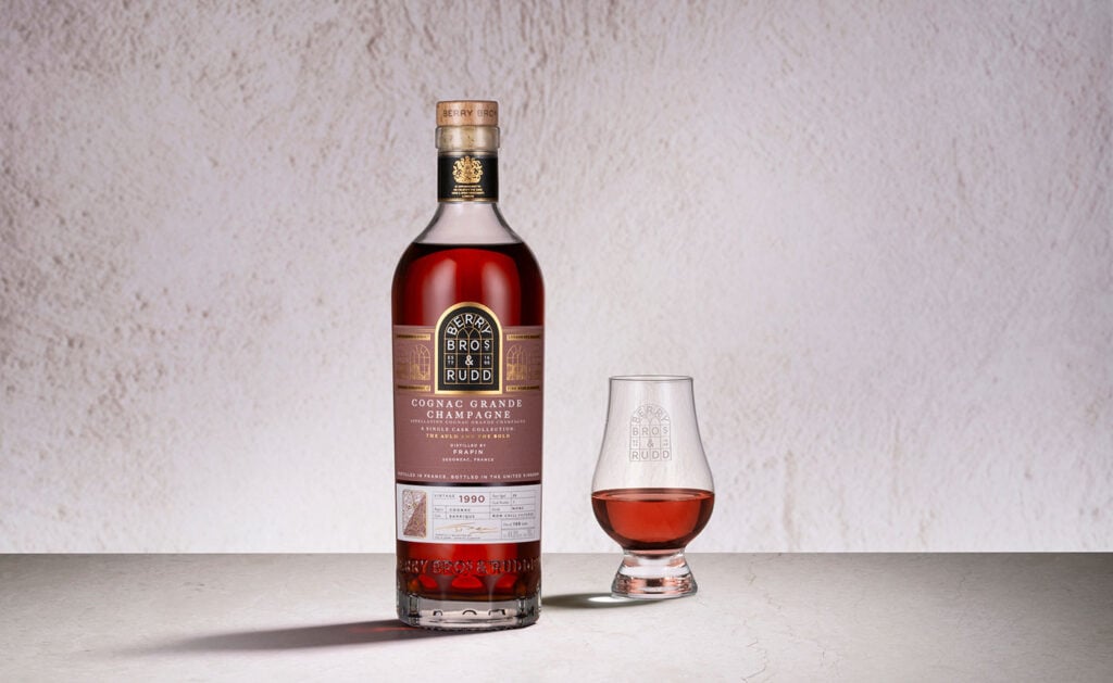 A bottle and glass of Frapin 35 Year Old 1990 (cask 1) Odyssey Range Release