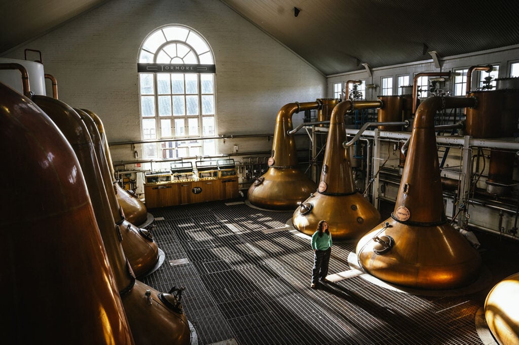Distillery manager Polly Logan inside Tormore Distillery's stillhouse