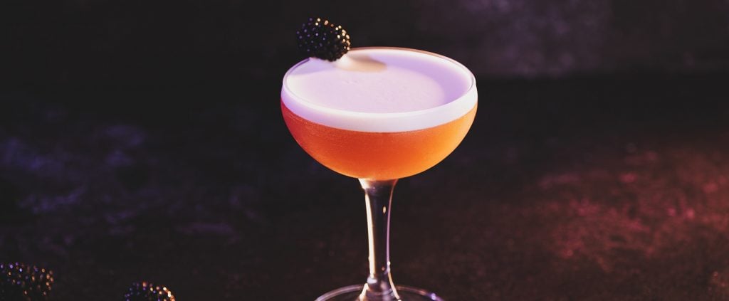 Smoky French Martini made with Laphroaig Islay whisky and Chambord raspberry liqueur