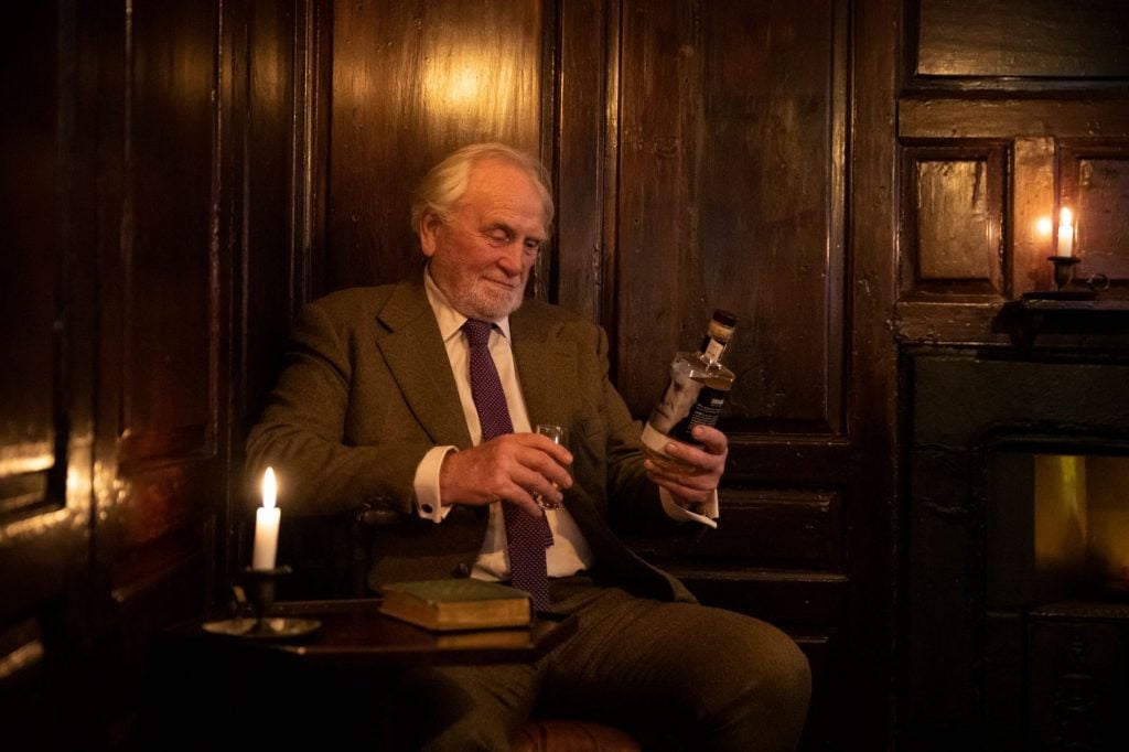 James Cosmo drinking Storyman whisky