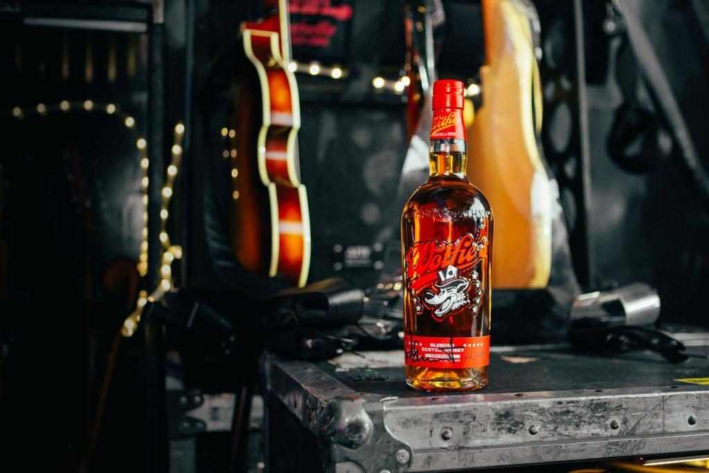 Wolfie's whisky - wine a bottle signed by Rod Stewart