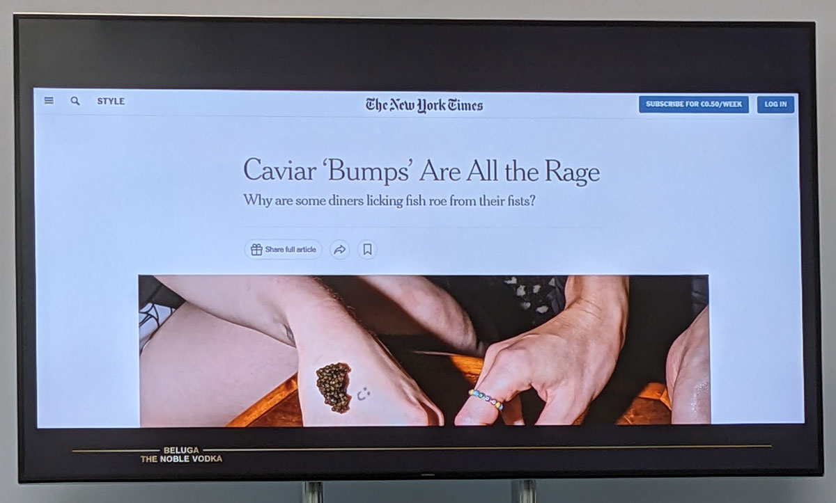 A presentation screen displaying a New York Times story about caviar bumps