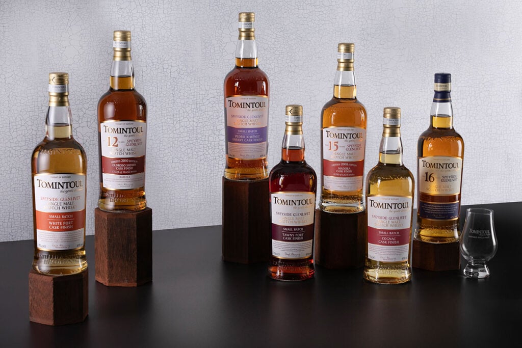 A bundle of Tomintoul Scotch whisky, comprised of several bottles of single malt Scotch whisky from the distillery