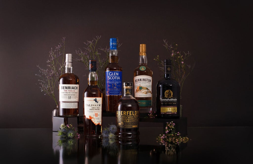 Scotch whisky bottles arranged for the Explore Scotch Competition by Master of Malt