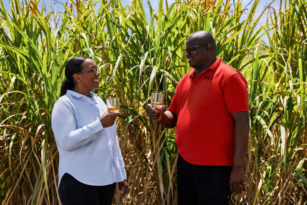 The Mount Gay Single Estate Series and its creator, master blender Trudiann Branker, pictured in a sugar cane field