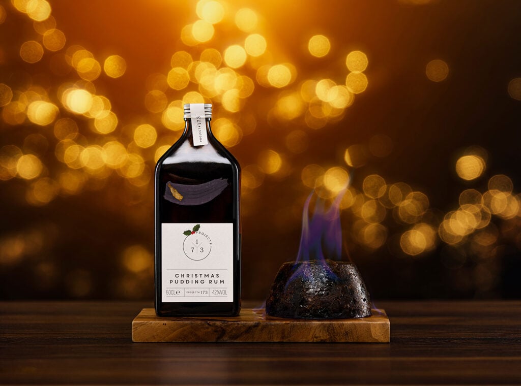Project #173 Christmas Pudding Rum with a Christmas pudding in a festive scene