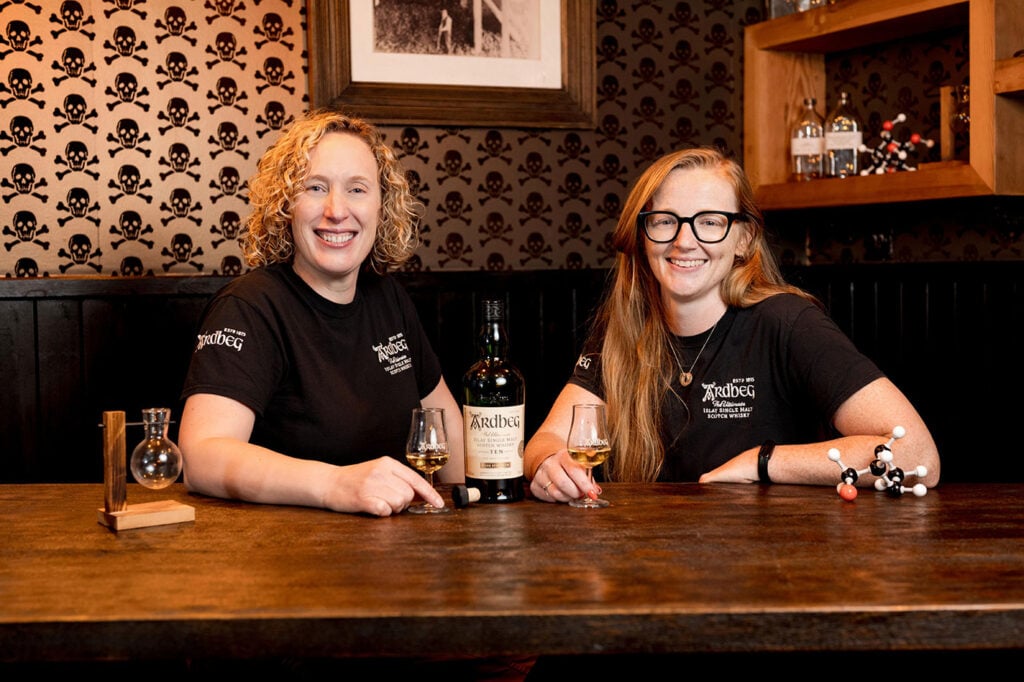 Gillian MacDonald and Bryony NcNiven share a bottle of Ardbeg 10 Year Old Cask Strength