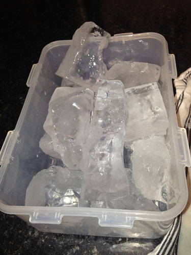 Clear ice in container